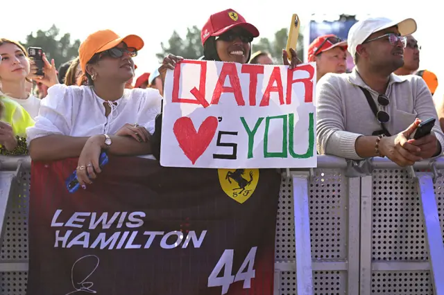 Fans hold up sings for Lewis Hamilton in Qatar