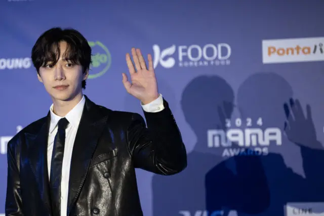 outh Korean actor and singer Lee Jun-ho arrives on the red carpet to attend the 2024 MAMA Awards in the city of Osaka