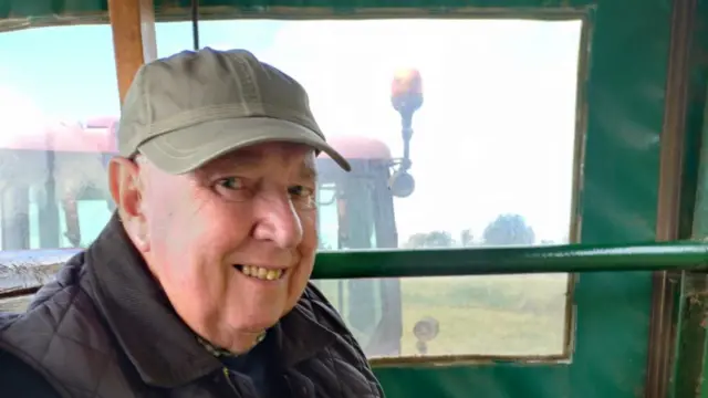 George Jones looks to camera and smiles for the photo