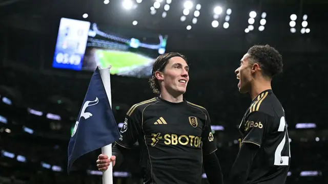 Harry Wilson (L) celebrates scoring the team's second goal