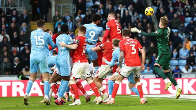 Ellis Simms leaps to score Coventry's second against Charlton