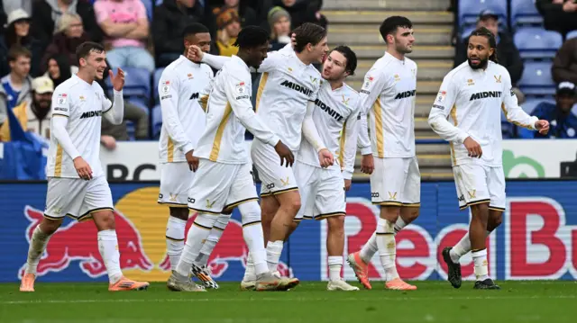 Sheffield United players celebrate with goalscorer Sydie Peck