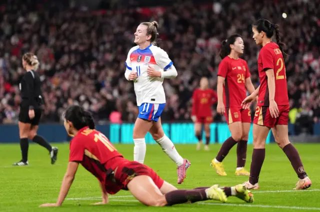 Lauren Hemp celebrates