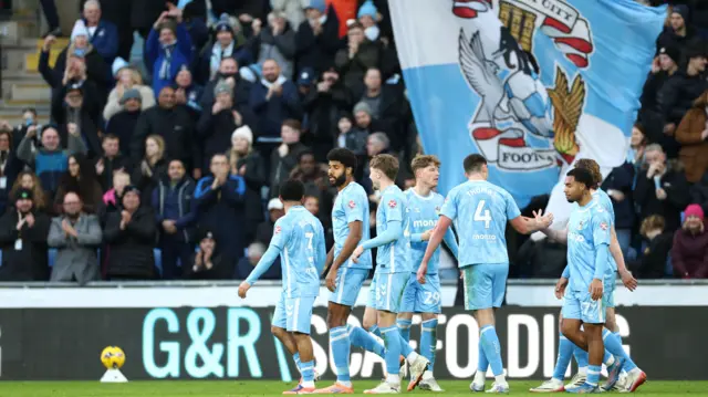Coventry players celebrate in front of their home fans