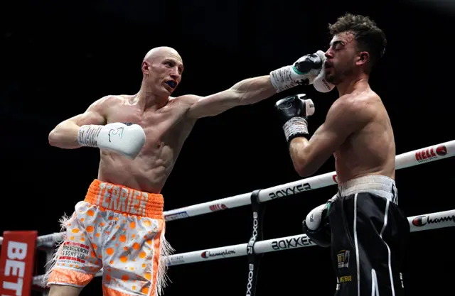 Scott Melvin punches Harvey Sturton