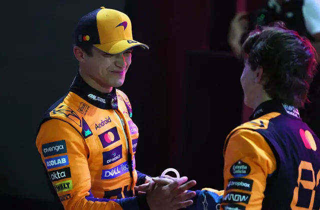 Lando Norris and Oscar Piastri shake hands