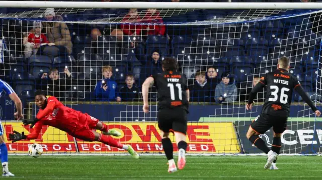 Max Watters sees penalty saved by Toby Oluwayemi
