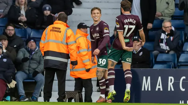 Ethan Galbraith celebrates after scoring Swansea's second goal at West Brom