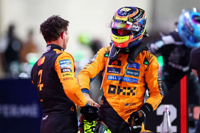 Lando Norris and Oscar Piastri shake hands after the sprint race