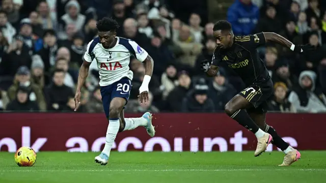 Mohammed Kudus and Ryan Sessegnon battle for a ball