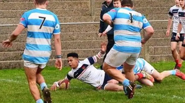 Sacha Feinberg-Mngomezulu scoring for Llandovery College against Pembrokeshire College in 2018
