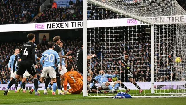 Manchester City's Croatian defender #24 Josko Gvardiol scores his team's second goal during the English Premier League football match between Manchester City and Leeds United at the Etihad Stadium