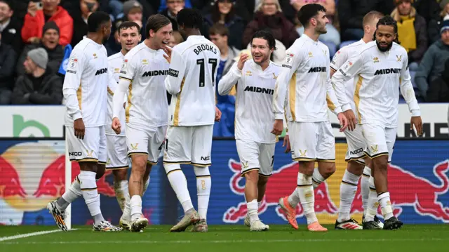 Sheffield United players celebrate with goalscorer Sydie Peck