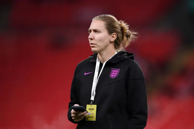 Anna Moorhouse of England inspects the pitch prior to the Women's international friendly match between England and China PR at Wembley Stadium on November 29, 2025 in London, England.
