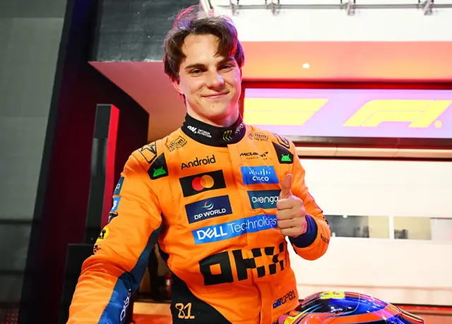Oscar Piastri gives a thumbs up after securing pole for the Qatar sprint