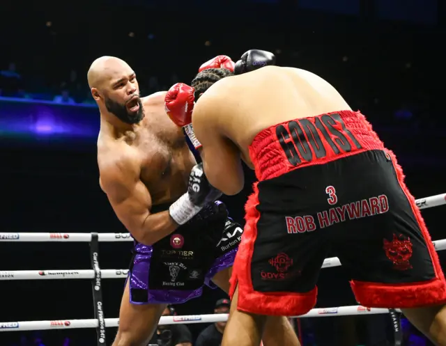 Frazer Clarke lands a punch on Jeamie TKV