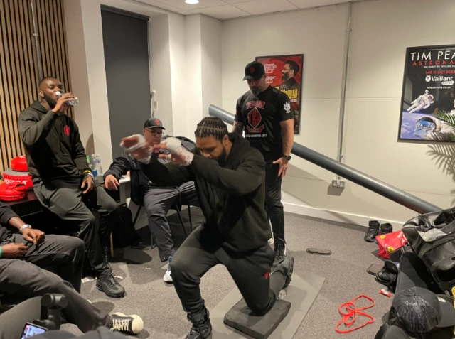 Jeamie TKV stretching backstage