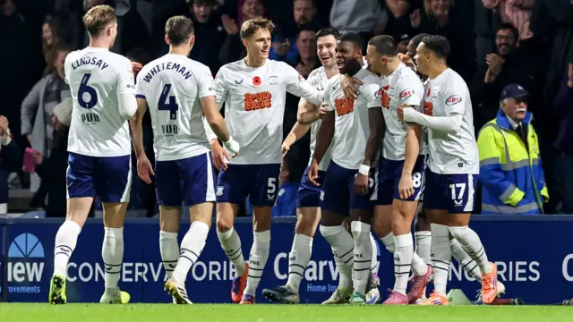 Preston players congratulate Thierry Small on scoring