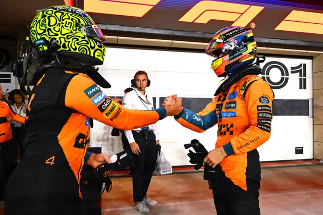 Lando Norris and Oscar Piastri shake hands