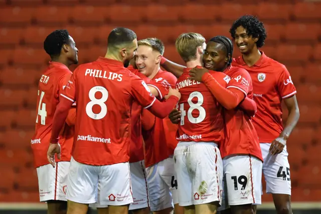 Barnsley players celebrate a goal in the 5-0 win against Luton