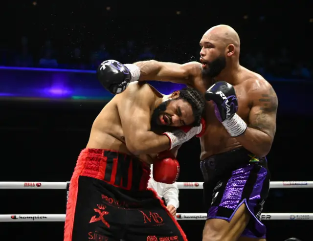 Frazer Clarke misses Jeamie TKV with a punch