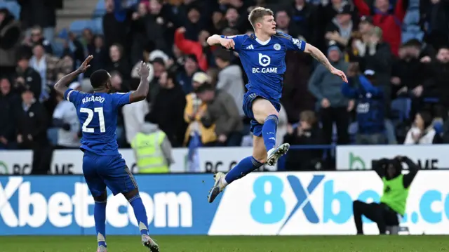 Jordan James jumps into the air in celebration