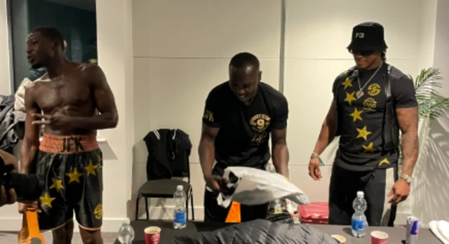 Joel Kodua, Anthony Yarde and Tunde Ajayi backstage in a dressing room