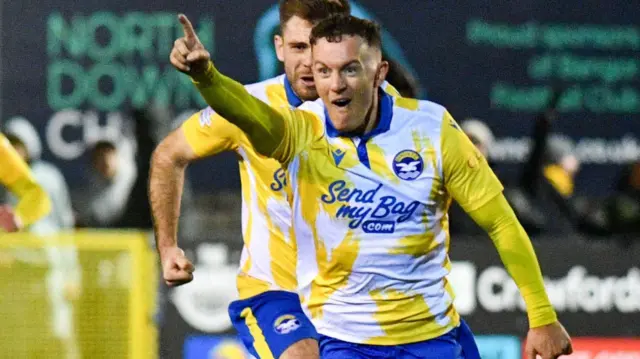 Tiarnan Mulvenna celebrates after scoring