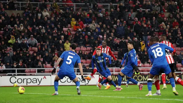 Bertrand Traore of Sunderland scores