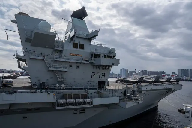 F-35B Lightning II stealth fighter jets are seen on the flight deck of British aircraft carrier HMS Prince of Wales, docked at the Tokyo International Cruise Terminal in Tokyo on August 28, 2025.