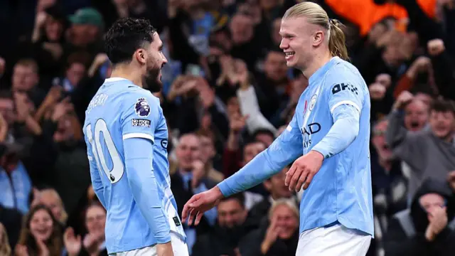 Erling Haaland and Rayan Cherki