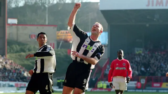 Alan Shearer celebrates after scoring for Newcastle