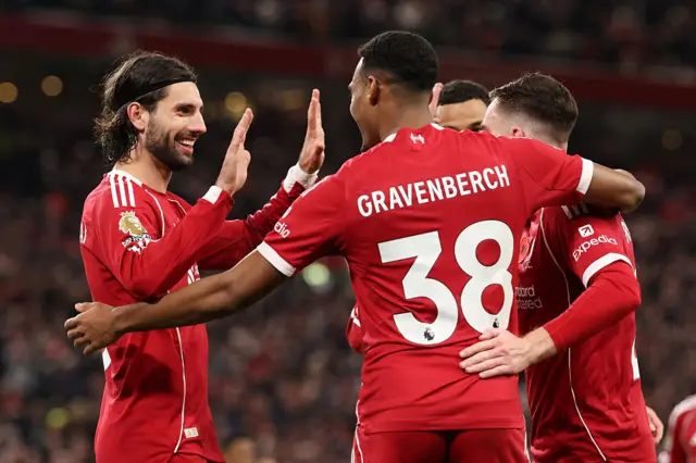 Ryan Gravenberch celebrates scoring his team's second goal with Liverpool teammates