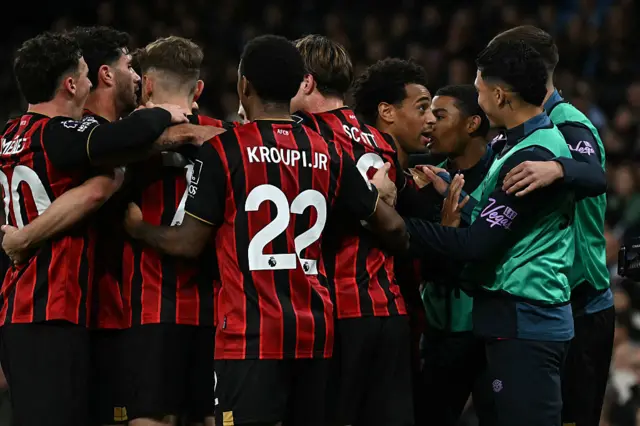 Tyler Adams celebrating with teammates after scoring