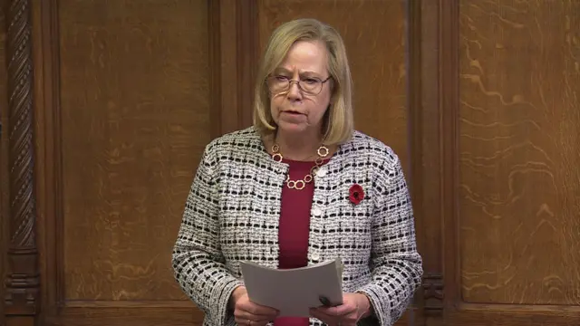 Ruth Cadbury holds a sheet of paper in the house of commons
