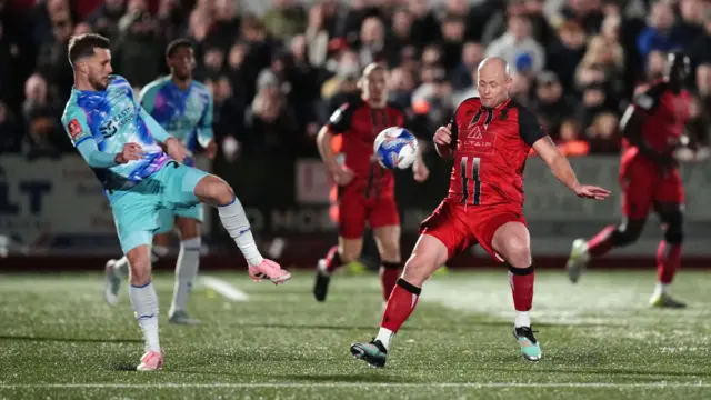 Tamworth's Tom Tonks closes down Leyton Orient's Tom James