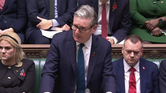 Keir Starmer stands in the house of commons