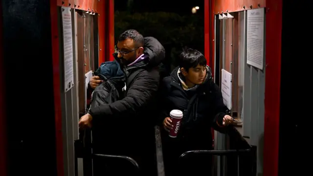 Fans go through the turnstiles at Tamworth's The Lamb Ground