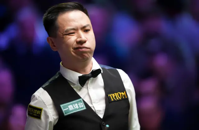 Xiao Guodong in action against Pang Junxu, on day two