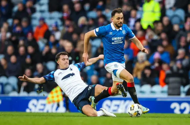 Nedim Bajrami in action at Ibrox