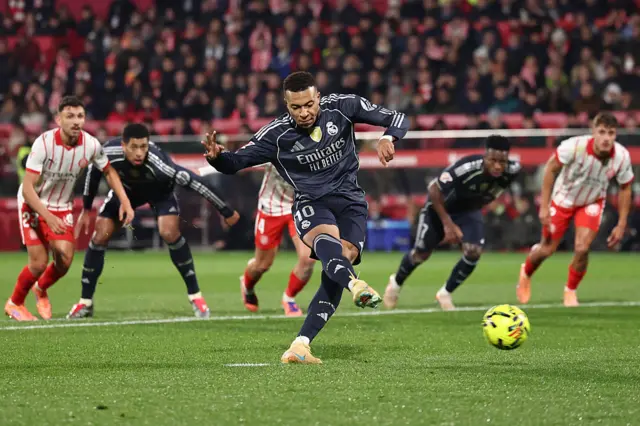 Kylian Mbappe scores