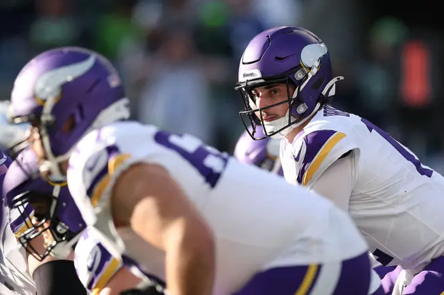 Max Brosmer behind centre gets ready to receive the ball