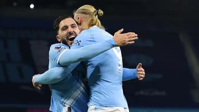 Rayan Cherki and Erling Haaland