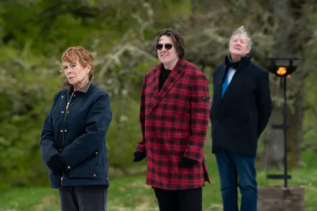 Celia Imrie, Jonathan Ross - wearing a red and black checquered long blazer - and Stephen fry