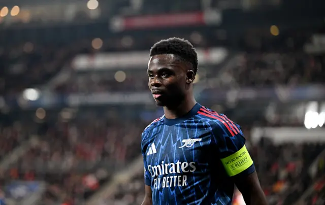 Bukayo Saka of Arsenal looks on