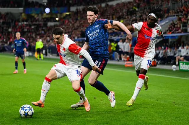 Christos Zafeiris of Slavia Prague covers the ball from Declan Rice
