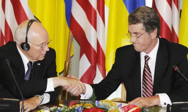Dick Cheney shakes hands with Ukrainian president Viktor Yushchenko during talks in Kyiv in 2008.