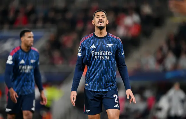 William Saliba of Arsenal reacts