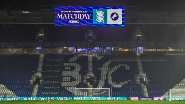 The scoreboard at St Andrew's displaying the badges of Birmingham and Millwall