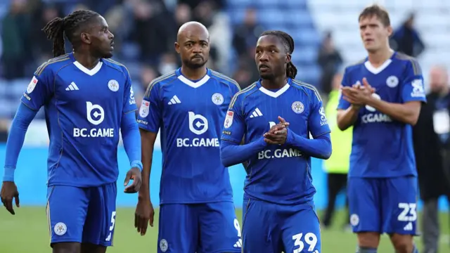 Dejected looking Leicester City players